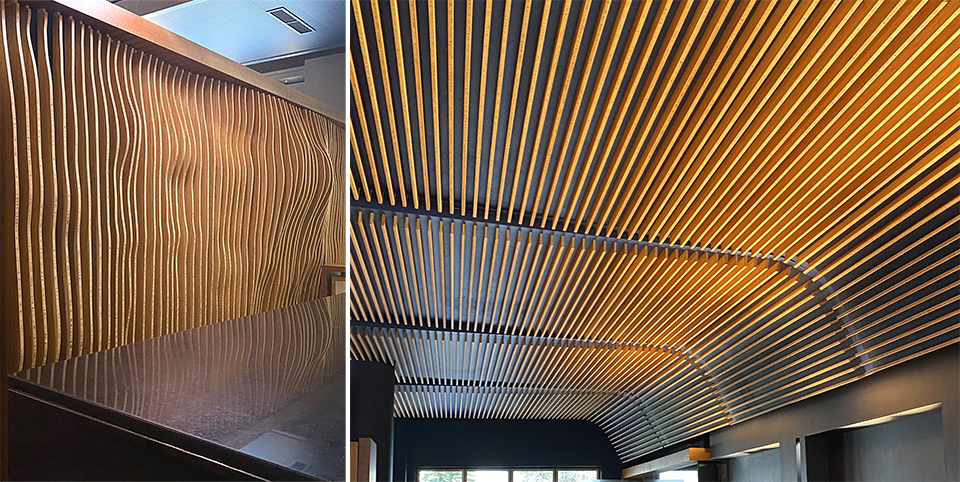 Ceiling and surface of separating furniture covered with bamboo slats. 